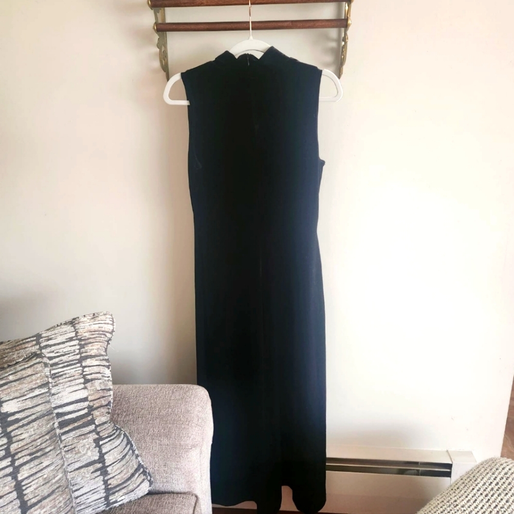 Long black, sleeveless velvet dress by Ronnie Nicole